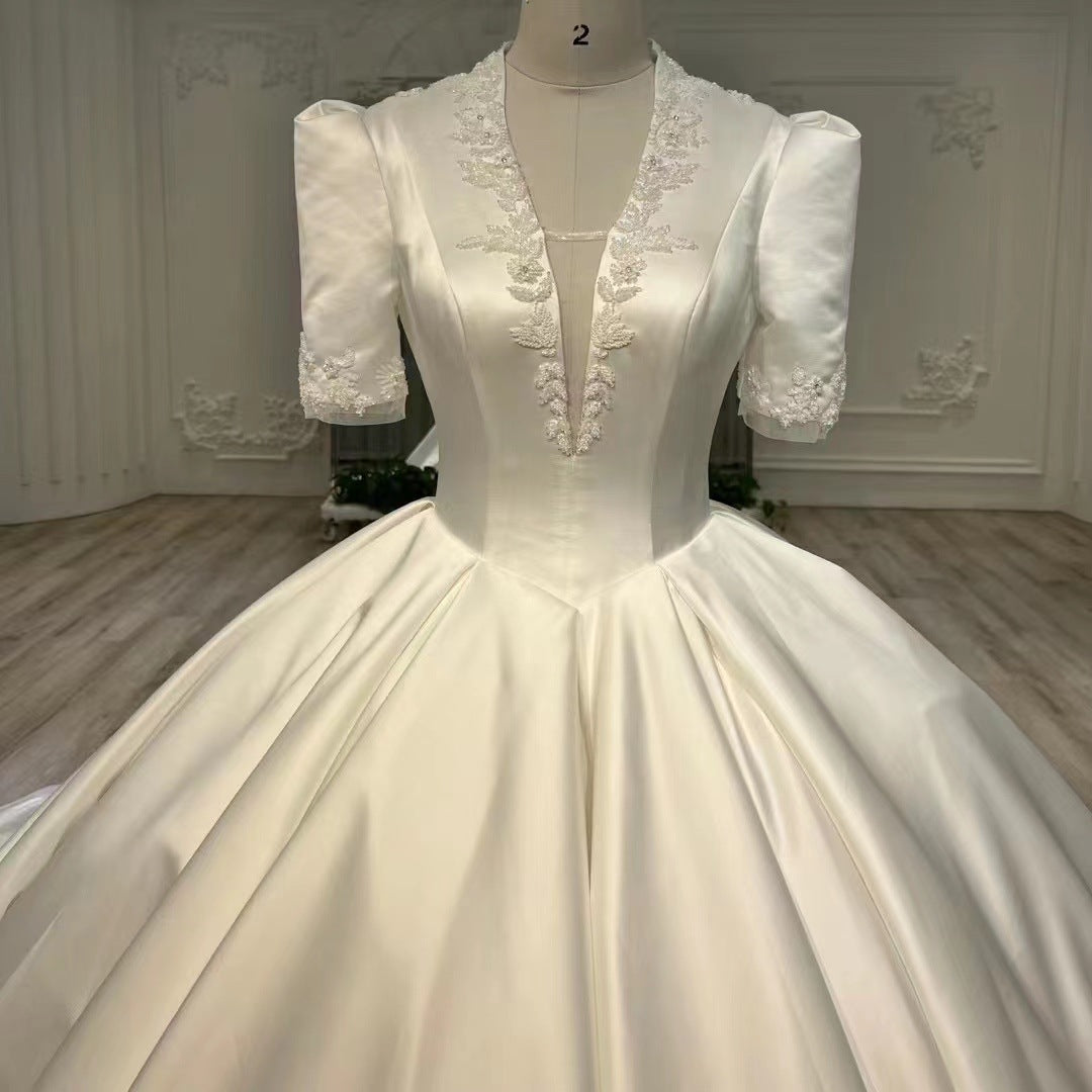 BelaCustom Appliques Plunging V-Neck Half Sleeves Ball Grown Satin Court Wedding Dress