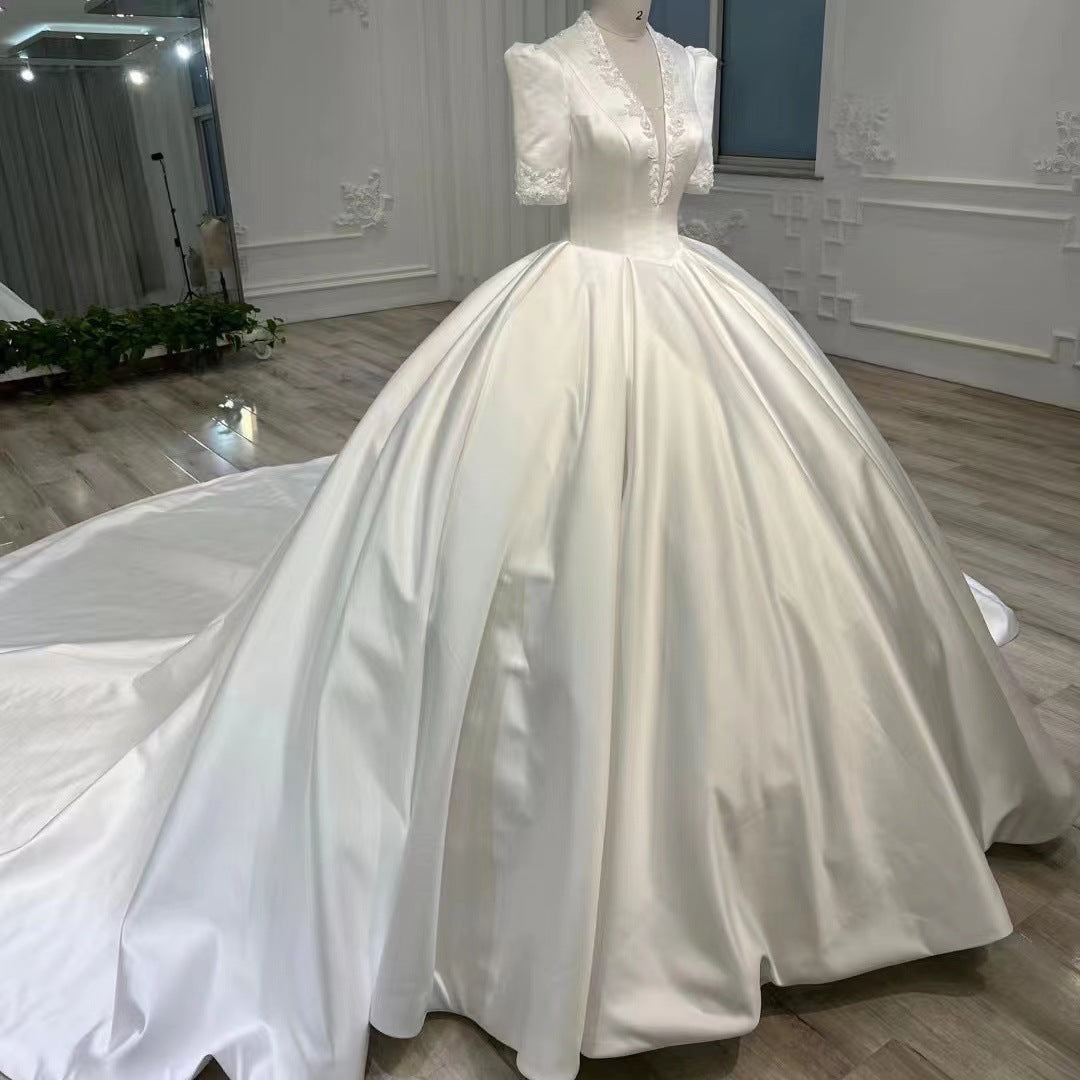 BelaCustom Appliques Plunging V-Neck Half Sleeves Ball Grown Satin Court Wedding Dress